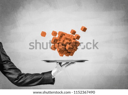 Cropped image of waiter's hand in white glove presenting multiple cubes on metal tray with gray concrete wall on background. 3D rendering.