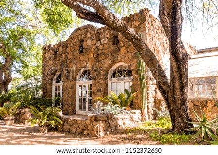 Stone building with round top windows
