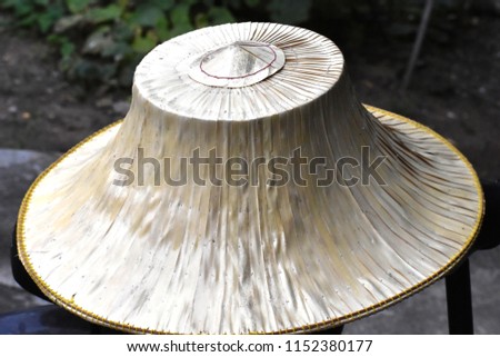 A closeup image of hat, Handicraft product from bamboo and palm leaves