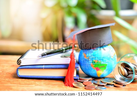 hat graduation on global model for concept investment education and scholarships finance Royalty-Free Stock Photo #1152414497