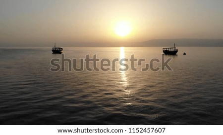 2 Boats anchored on the Sea of Galilee