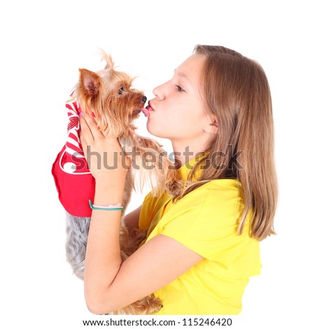 pretty young girl kissing her cute little dog