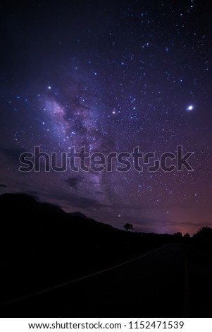 Night sky stars with milky way on mountain background