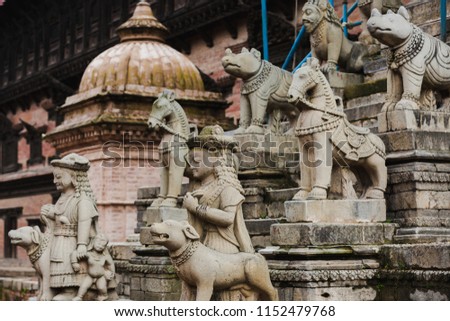 Ancient historical stone carving sculpture placed in bhaktapur durbar square Nepal.