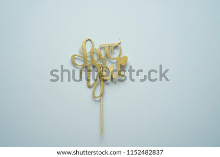 Golden love you word over white background