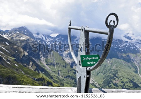 The Grossglockner (German name is Großglockner) in summer with could and direction wise