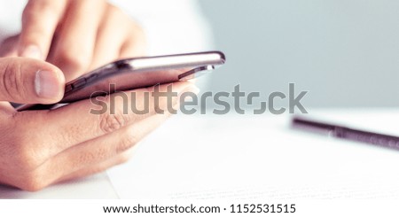 businessman working with modern devices and mobile phone with copy space.