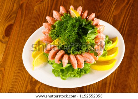 Shrimp cocktail with lemon and herbs