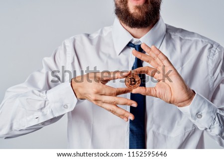 coin fingers fingers man beard                           