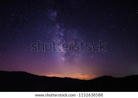 Beautiful night landscape with the milky way in a starry night of Juzcar, small village of the Spanish Andalucia.