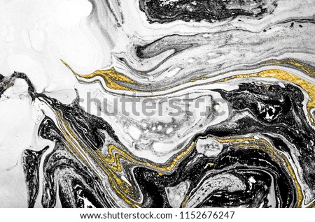 Suminagashi – the ancient art of Japanese marbling. Paper marbling is a method of aqueous surface design, which can produce patterns similar to smooth marble or other kinds of stone. Natural luxury.  Royalty-Free Stock Photo #1152676247