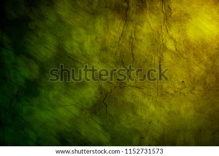 Old hard cracked paper background in dark colors