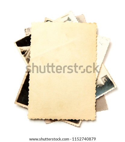 Stack old photos isolated on white background. Mock-up blank paper. Postcard rumpled and dirty vintage. Retro card