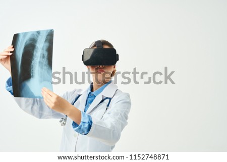 doctor is watching x-ray 3D glasses                              