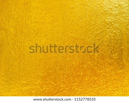 Gold concrete wall background for texture design