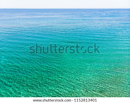 Azure sea water texture gradient drone shot frome above Kartagena, Murcia, Spain, Summer 2018