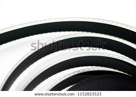 35mm Movie Film Reel, Motion Picture Film Isolated On White Background.
