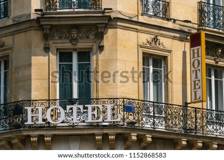 beautiful old hotel sign in paris