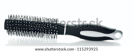 Black plastic comb isolated on white