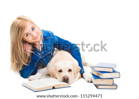 beautiful girl in blue reading a book with pale-yellow Labrador retriever dog on the isolated white background