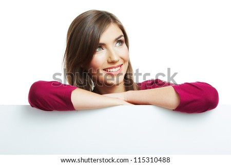 Smiling woman with  big blank board . Close up female face portrait with arms on blank card. Thumb up.
