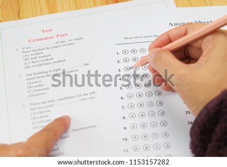 English multiple choice test on table Royalty-Free Stock Photo #1153157282