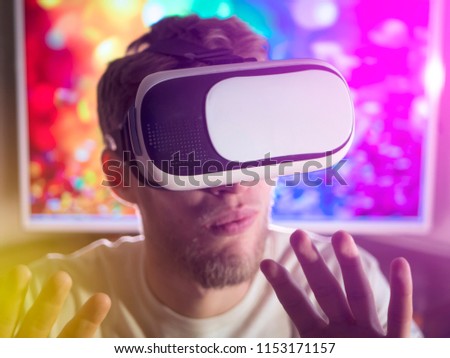 close up man head in virtual reality headset on abstract background, toned, concept