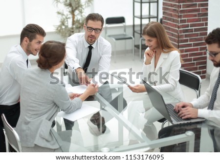 business team discussing business documents