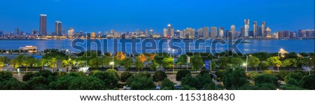 Panorama:：evening, the city of Ganjiang River in Nanchang, China.City, Cityscape, Bridge - Built Structure, Building Exterior, Famous Place