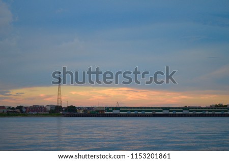 Orange clouds over the Mississippi River