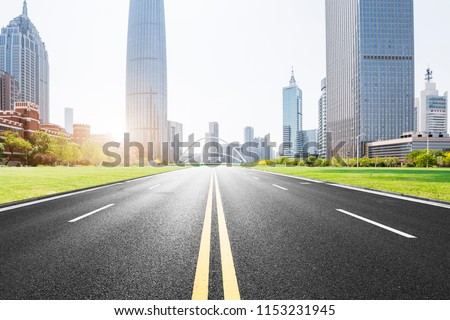 China's modernized first line urban roads and commercial office areas.
