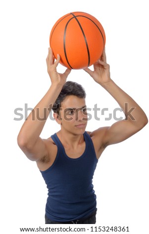 Portrait of a young basketball player passing the ball. Young caucasian boy in sportswear playing basketball on white background with copyspace
