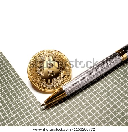 Bitcoin with a pen on paper background