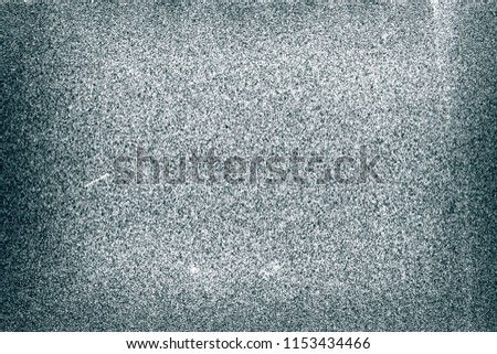 Noisy old filmstrip texture background with heavy grain and dust