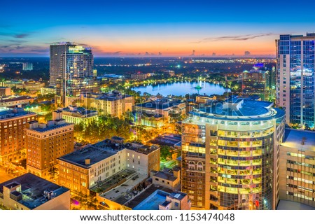 Orlando, Florida, USA aerial cityscape towards Lake Eola at dusk. Royalty-Free Stock Photo #1153474048