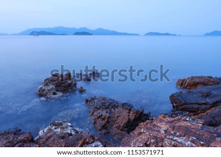 Coastal rocks in the sea with beautiful Gulf of Thailand.