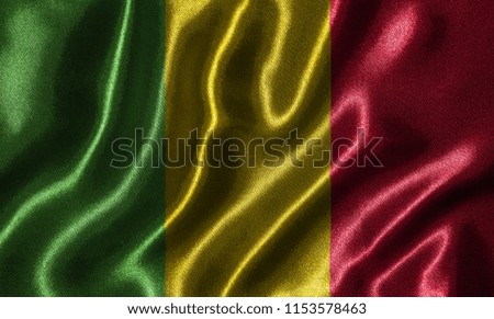 Mali flag - Fabric flag of Mali country, Background and wallpaper of waving flag by textile.