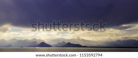 Dark Clouds, Mountains and Sunlight (The Hope)