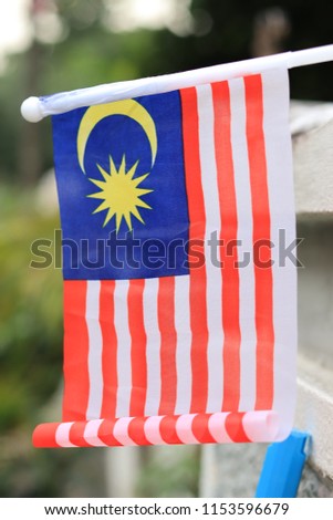 Malaysia flag shoot at outdoor. Malaysia independence day. waving flag.