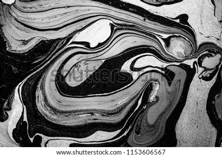 Magic marble texture. Trendy contemporary art. Unique painting.  Paper marbling is a method of aqueous surface design, which can produce patterns similar to smooth marble or other kinds of stone. Royalty-Free Stock Photo #1153606567