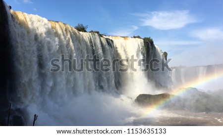 Rainbow with the Iguazu Falls