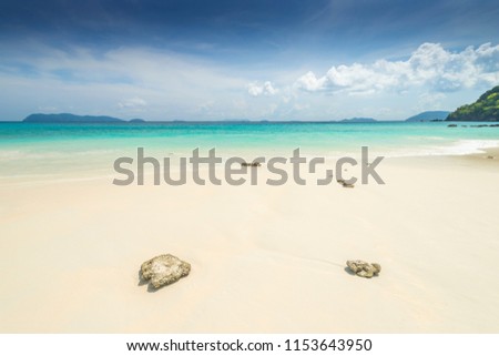 Sea view beautiful tropical beach background with horizon blue sky and white sand. Summer concept.
