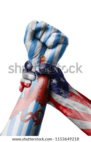 AMERICAN VS Blason Luxembourg, Fist painted in colors of Blason Luxembourg  flag, fist flag, country of Blason Luxembourg  
