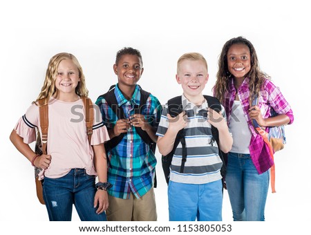 Group portrait of pre-adolescent school kids smiling on a white background. Back to school photo of a diverse group of children wearing backpacks isolated on a white background Royalty-Free Stock Photo #1153805053