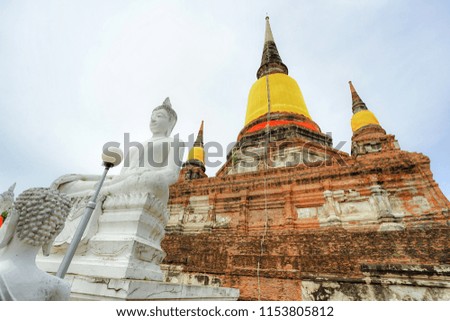 Ancient pagoda and the Buddha image in Wat Yai Chai Mongkhon, Ayutthaya province, Thailand.