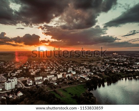 Sunset above city