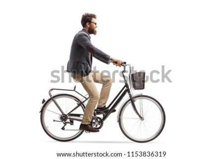 Young man riding a bike isolated on white background