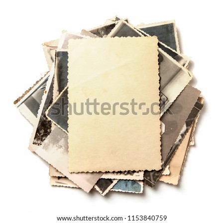 Stack old photos isolated on white background. Mock-up blank paper. Postcard rumpled and dirty vintage. Retro card