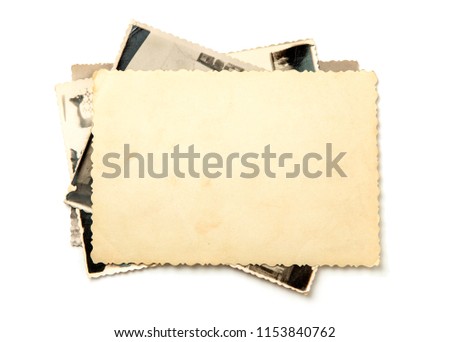 Stack old photos isolated on white background. Mock-up blank paper. Postcard rumpled and dirty vintage. Retro card Royalty-Free Stock Photo #1153840762