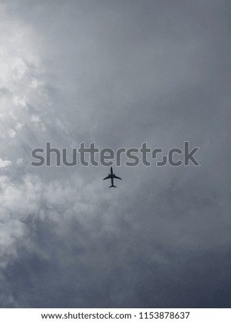 A picture of an airplane on the sky